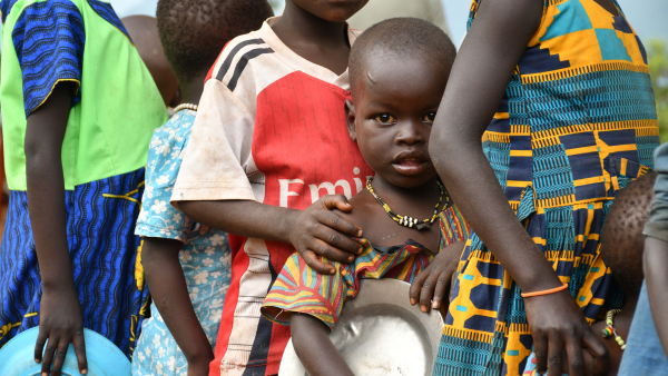 Children receiving meals through Feed My Starving Children